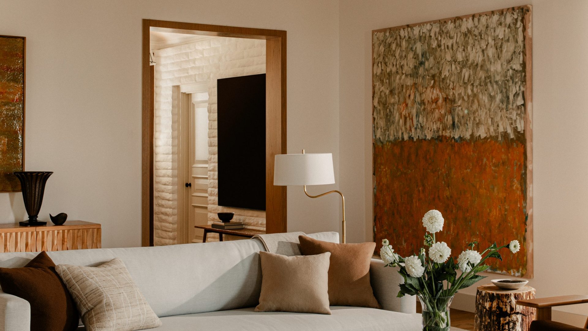 Linea Del Cielo, Rancho Santa Fe — living room with a large abstract artwork above a cream sofa