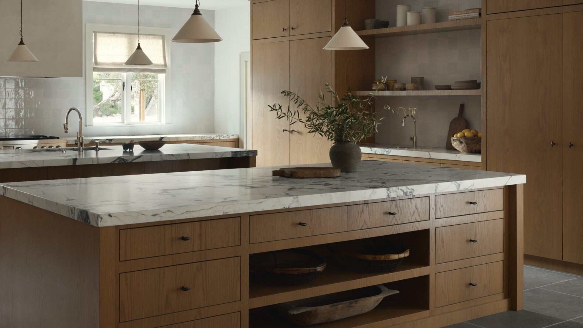 Rancho Mirage, California — kitchen in white oak with a marble island and open shelving